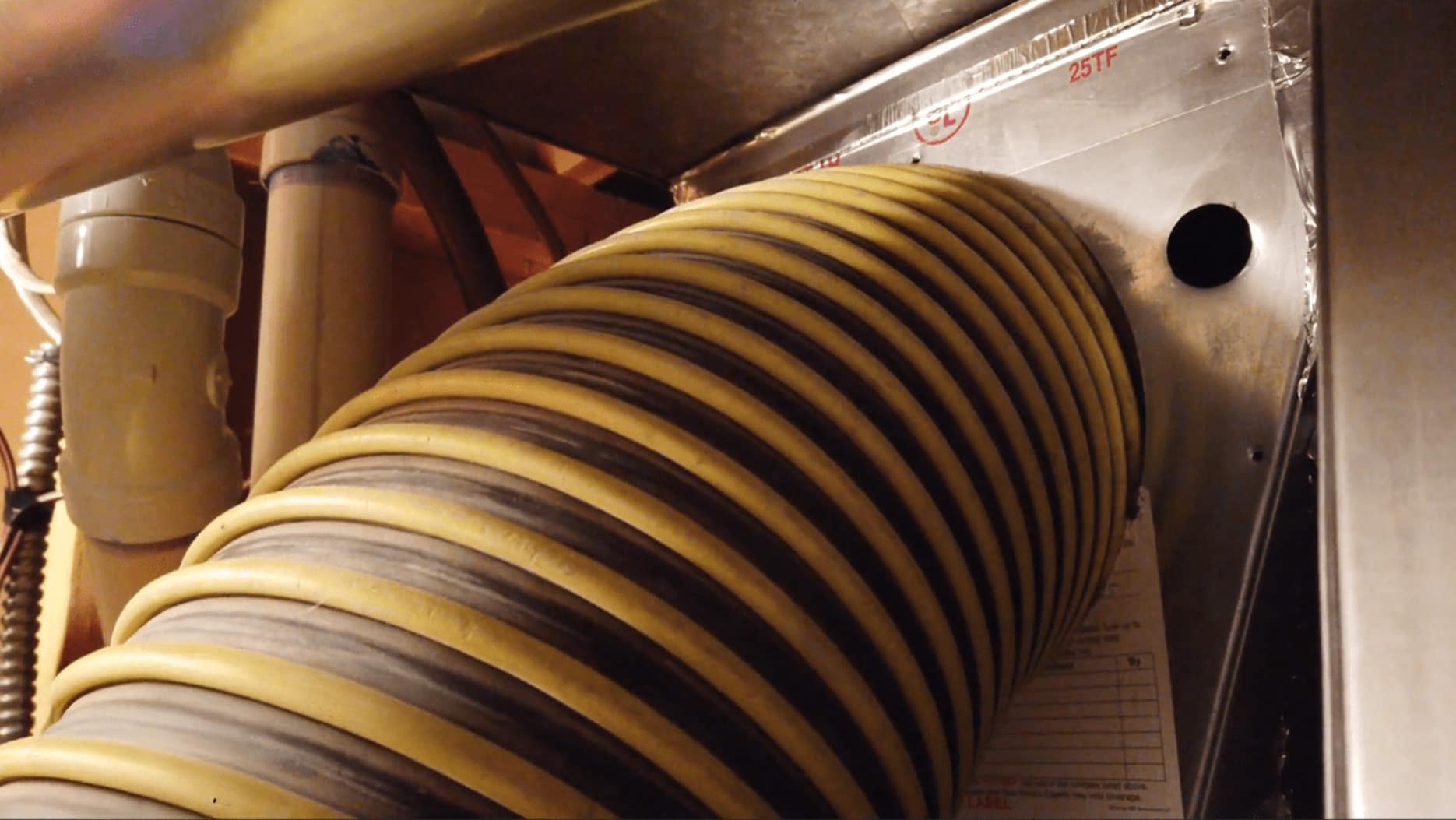 Negative-air hose coupled to a duct system