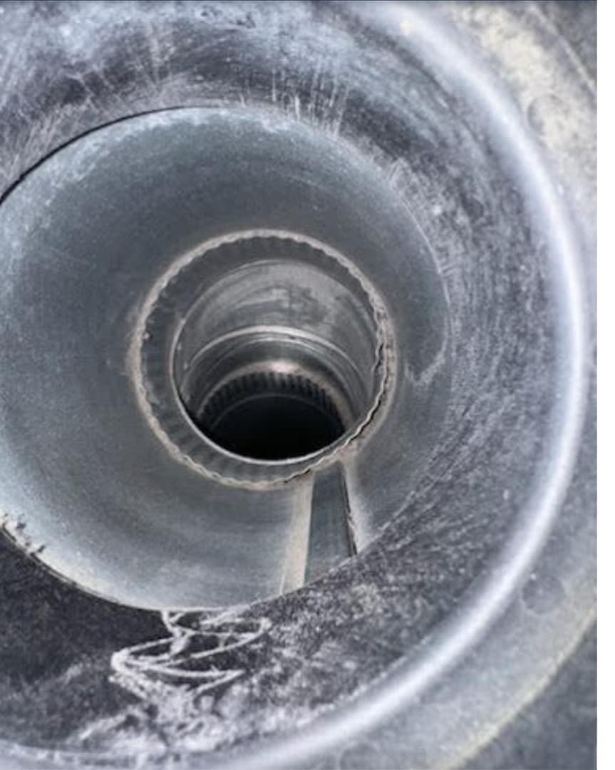 View along the inside of a round duct toward a branch takeoff