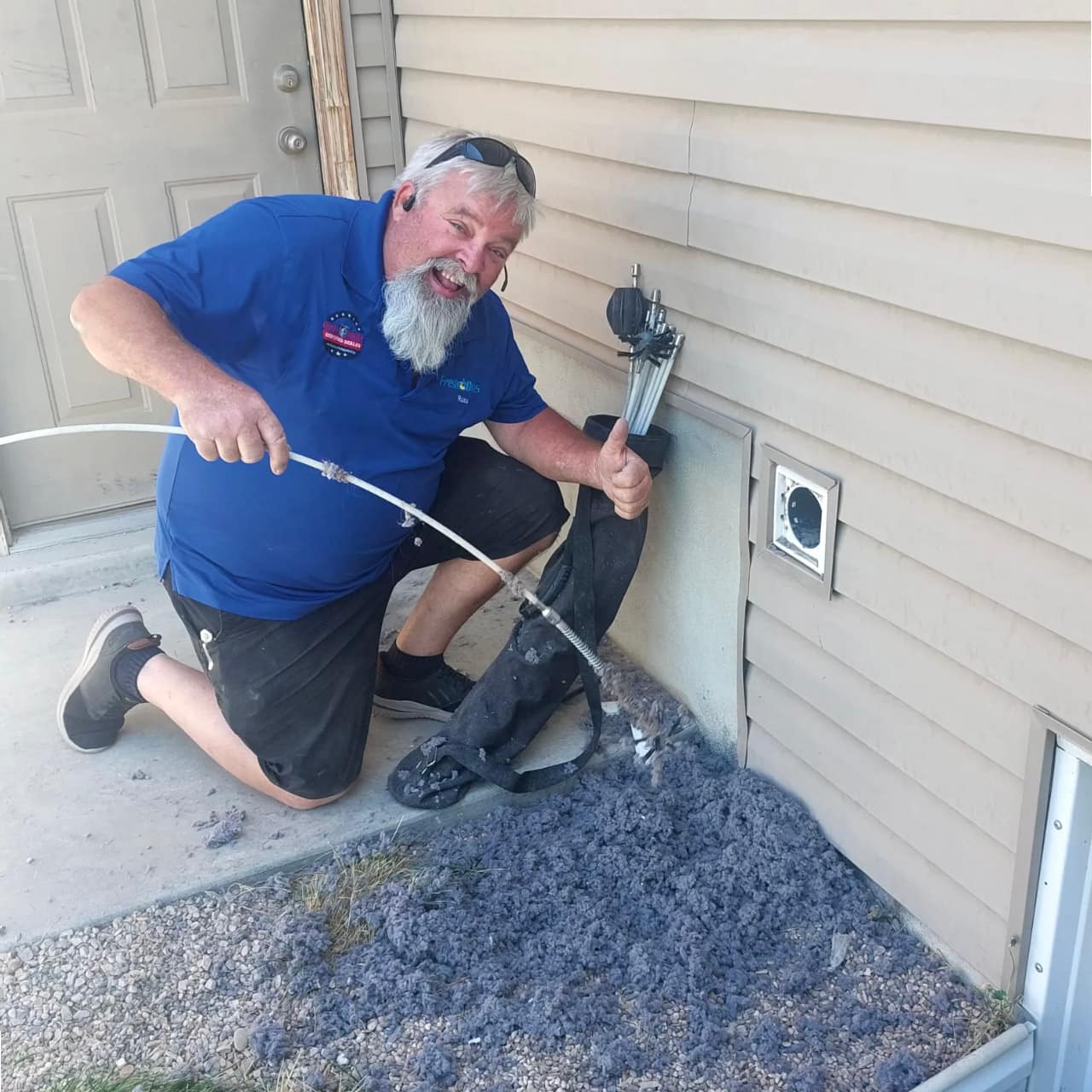 Fresh Ducts technician showing lint removed from a residential dryer vent